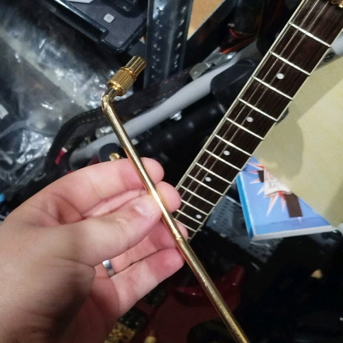 Electric guitar used for repair or decor