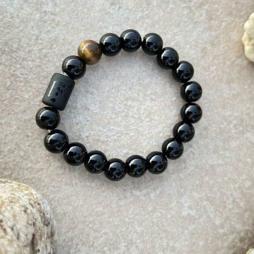 Unisex bracelet with black and brown beads like new