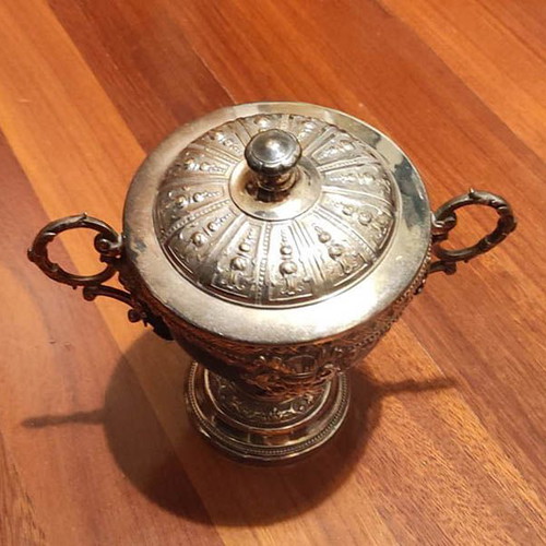 Decorative vessel used with glass interior and lid