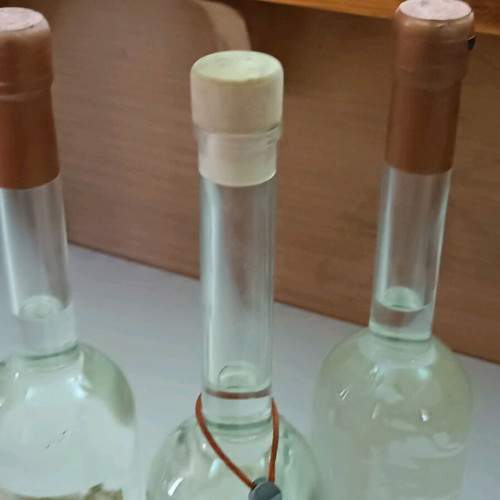 Methexis Distillate Cabernet Sauvignon pack with worn labels