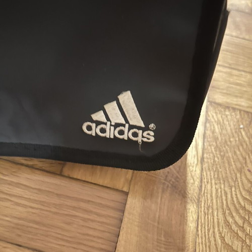 Two black leather toiletry bags, one Adidas