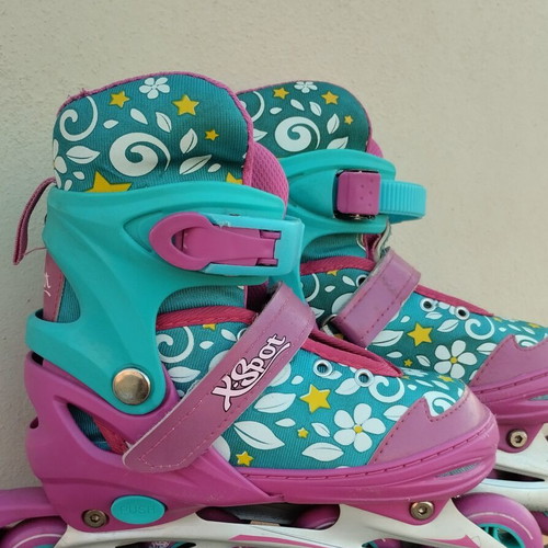 Xspot adjustable rollers size 35/37 used, turquoise pink with flowers