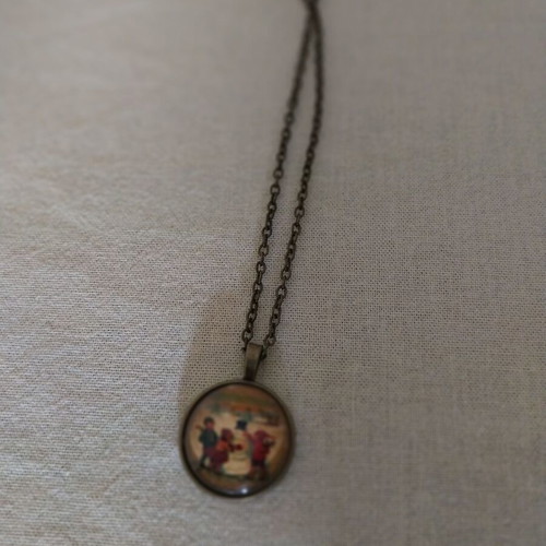 Vintage long necklace with snowman and children, like new