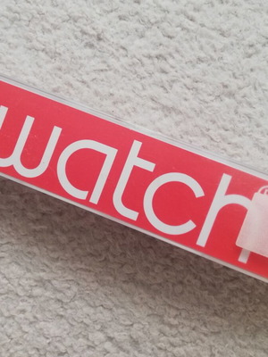 Swatch watch box used with documents