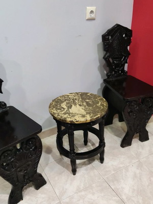Set of low chairs and carved wooden table very old