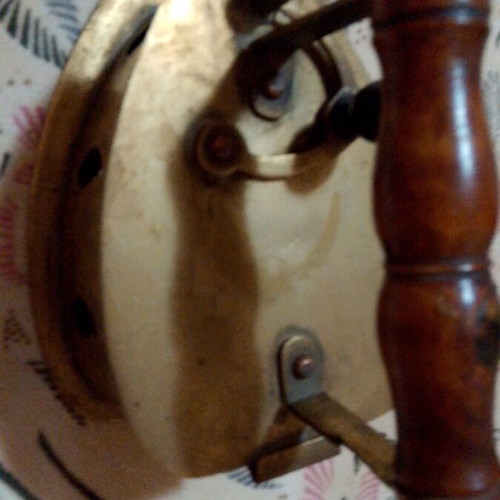 Vintage brass coal iron in golden tone, like new