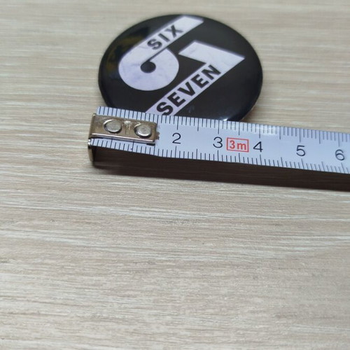 Pin 67 new, black, PVC material