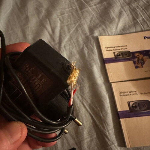 Panasonic EB-GD87 mobile phone used with box and charger needing repair