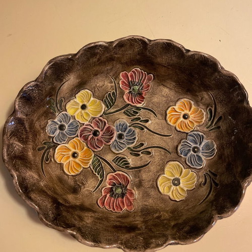 Vintage handmade ceramic bowl with embossed flowers like new