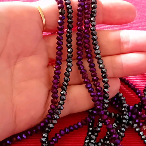 Package. Two long necklaces, in two shades.