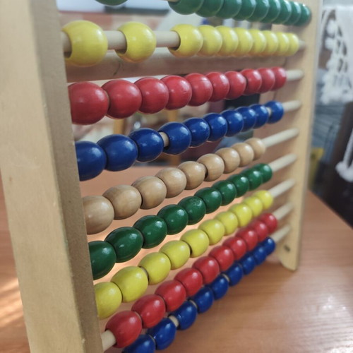 Wooden abacus with 10 colorful rows, educational toy