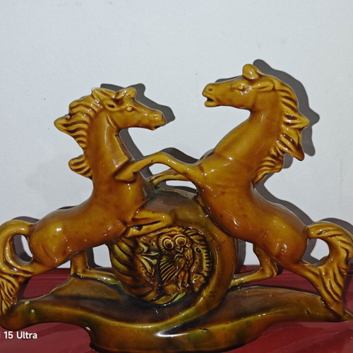 Vintage ceramic decoration with two horses and owl used