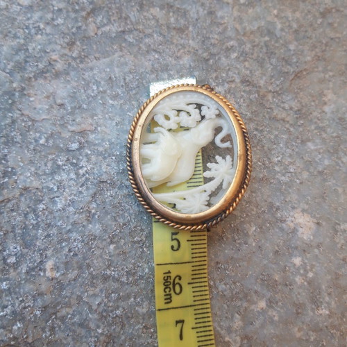 Vintage pin used, gold color, pierced design