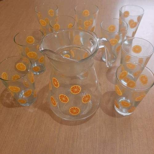 Duroglass pitcher and 10 glasses set like new