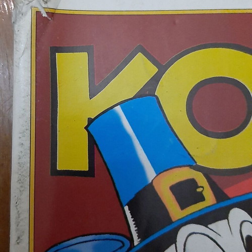 Komix 113 comic book used with damage on top left