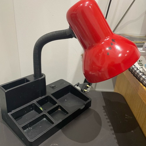 Desk lamp used with flexible arm in red color