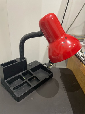 Desk lamp used with flexible arm in red color