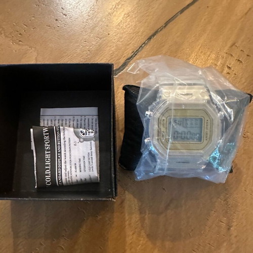 Casio digital sports wristwatch with transparent case and strap