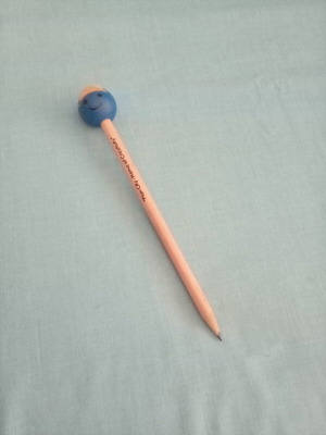 Plan City pencil with smiley on top