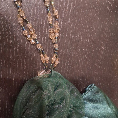 Satin evening bag in cypress color with beads like new