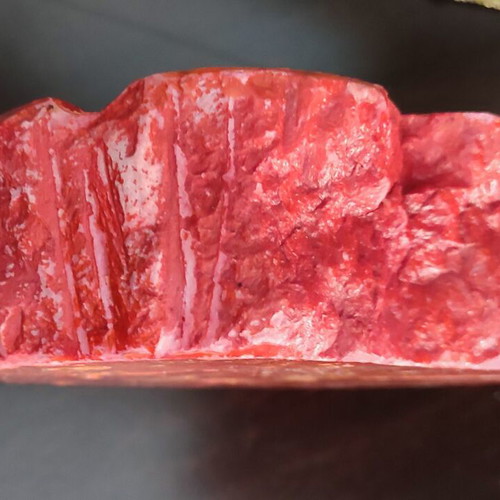 Large ashtray used red with veins