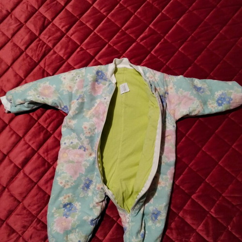 Baby sleeping bag or full-body romper with zipper and floral pattern like new