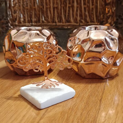 Decorative candle holders and tree of life set rose gold like new