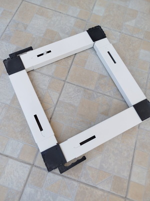 Washing machine dryer roller base