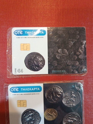 Pair of collectible phone cards S101-102 012/11' 4,000 print run sealed like new