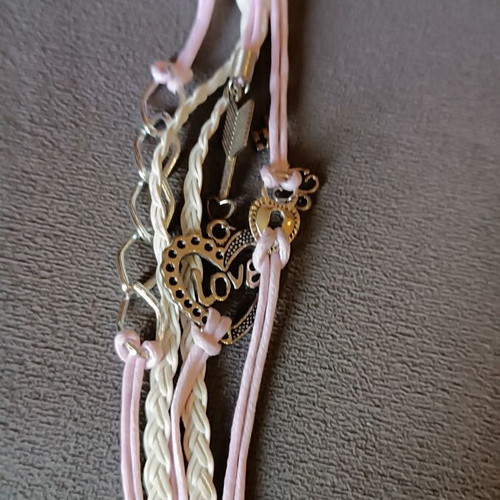 Love bracelet set new with white and pink cords and charms
