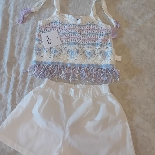 Set for 8-year-old girl with knitted top and cotton shorts