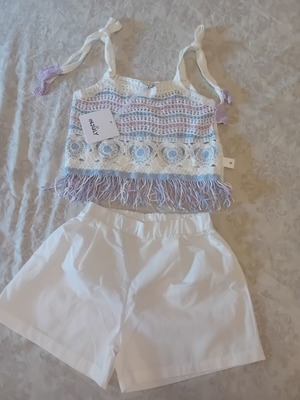 Set for 8-year-old girl with knitted top and cotton shorts