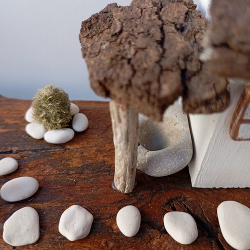 Handmade sea-themed driftwood diorama with Greek island house