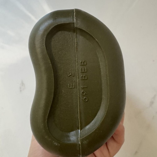 Military-style khaki water canteen with cap