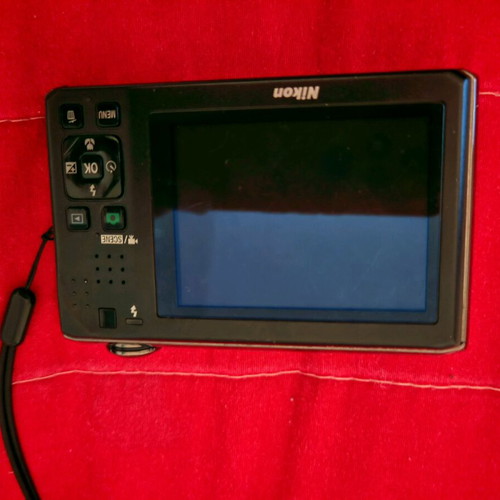 Nikon Coolpix S1000pj digital camera 12MP used with built-in projector