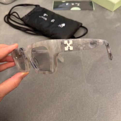 Off White marble sunglasses like new with box and case