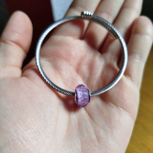 Steel bracelet new purple with internal glitter