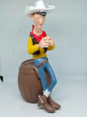 Lucky Luke collectible figure in barrel like new 19cm