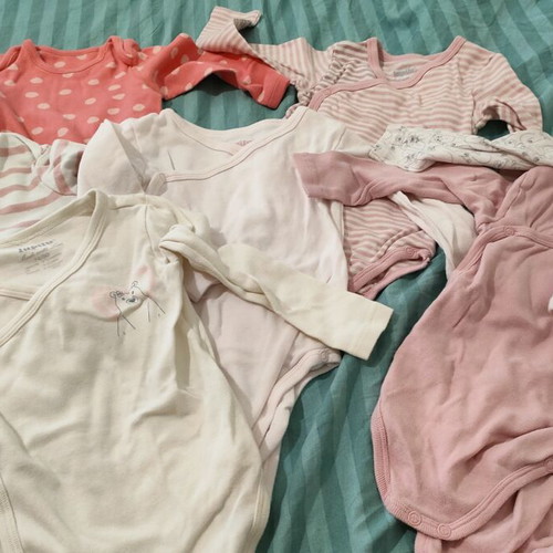 Long-sleeve baby vests like new, sizes 6-9 and 6-12 months