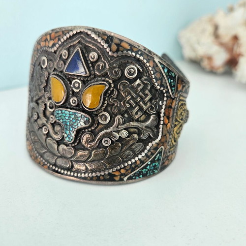 Handmade carved bracelet used with turquoise and silver