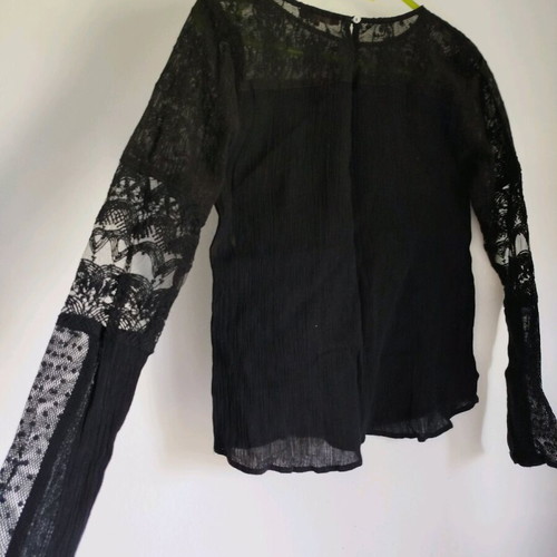 Blouse with perforated details used, size XS