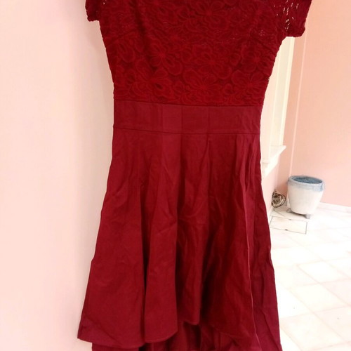 Women's asymmetrical dress new, size small, lace detail