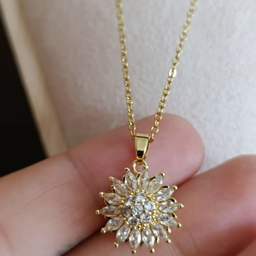 Necklace from stainless steel with zircon like new, gold tone, rotating