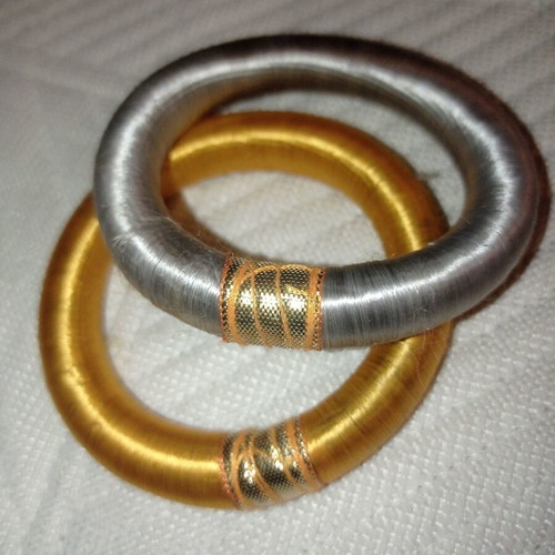 Set of 2 bracelets used, 6.5cm inner width