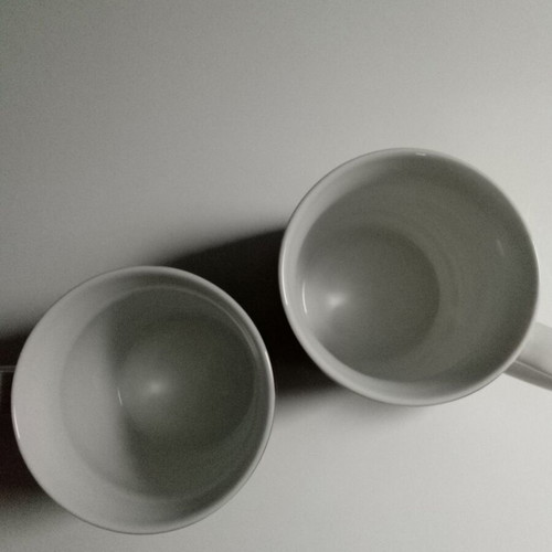 Set of white mugs with stripes like new