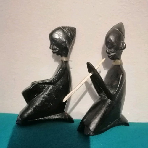 Ebony woodcarving set used, two African figures playing musical instruments