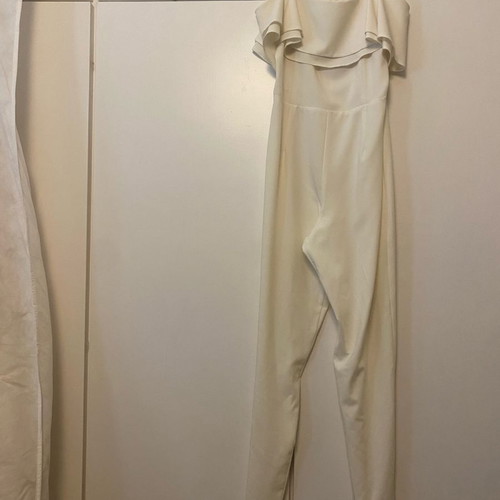One-piece jumpsuit worn, size small