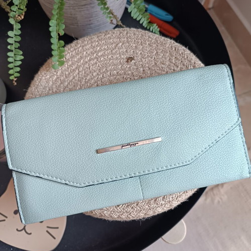 Women's wallet used, turquoise color