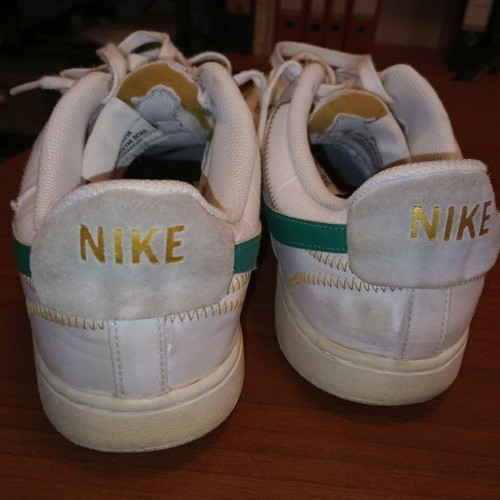 Nike low athletic shoes used, size 43, white with leather