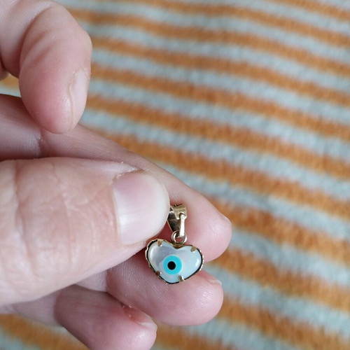 Silver heart 925 with evil eye used, gold color